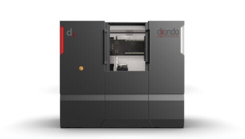 Immagine del sistema di Tomografia Computerizzata Diondo d1, un'unità compatta per l'analisi 3D non distruttiva di componenti industriali, con manipolatore in granito.